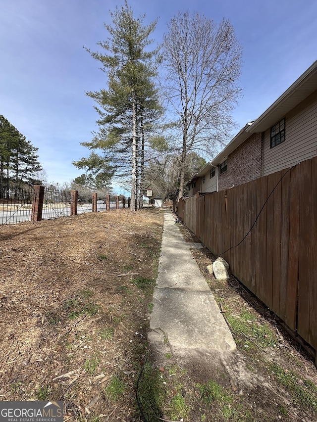 view of yard featuring fence