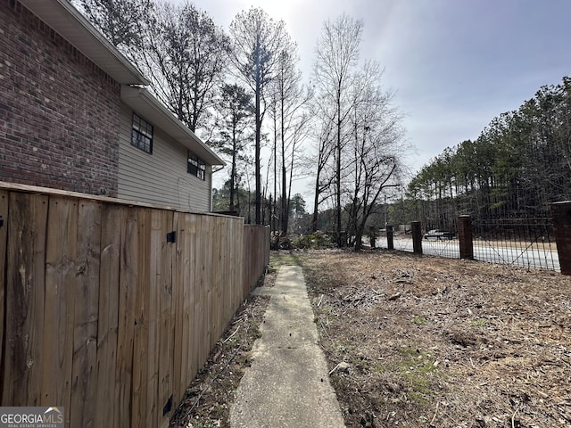 view of yard with fence