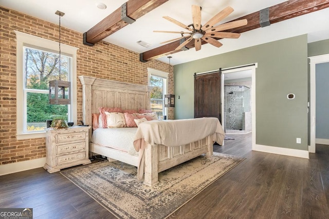 bedroom featuring beam ceiling, ceiling fan, a barn door, brick wall, and dark hardwood / wood-style floors