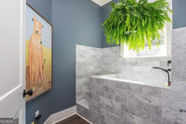 bathroom with wood-type flooring