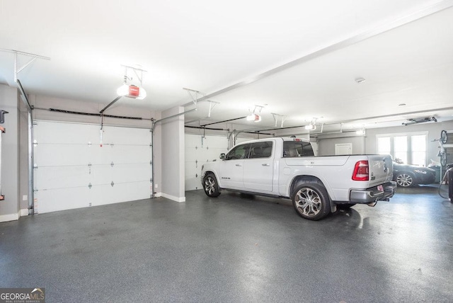 garage featuring a garage door opener