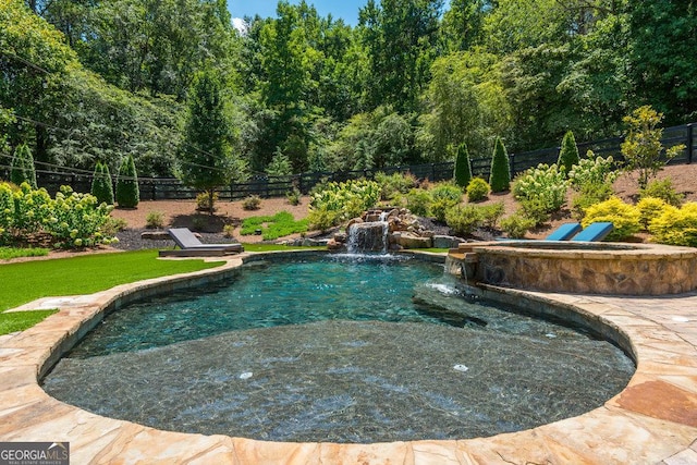 view of pool with pool water feature