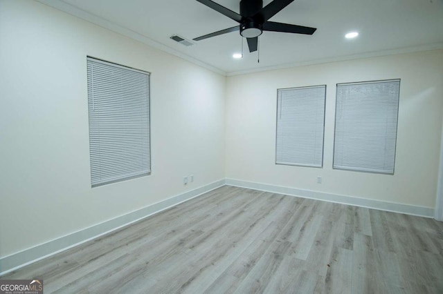 unfurnished room with ceiling fan, crown molding, and light hardwood / wood-style flooring