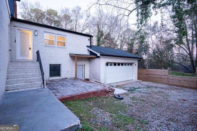 view of front of property featuring a garage