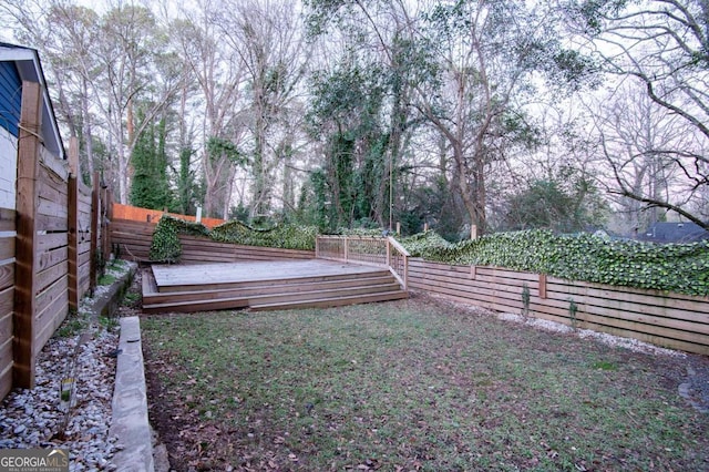 view of yard with a deck