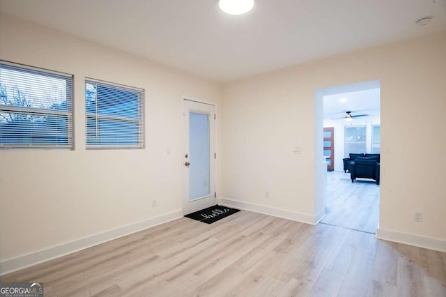 entryway with light hardwood / wood-style floors