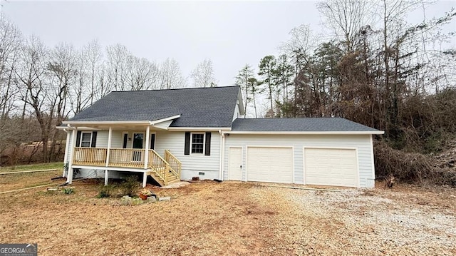 ranch-style house with a porch and a garage