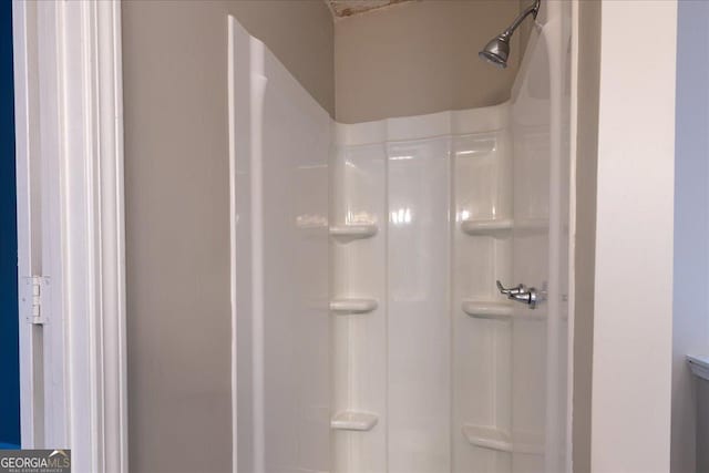 bathroom with walk in shower