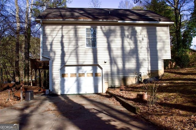 view of home's exterior with a garage