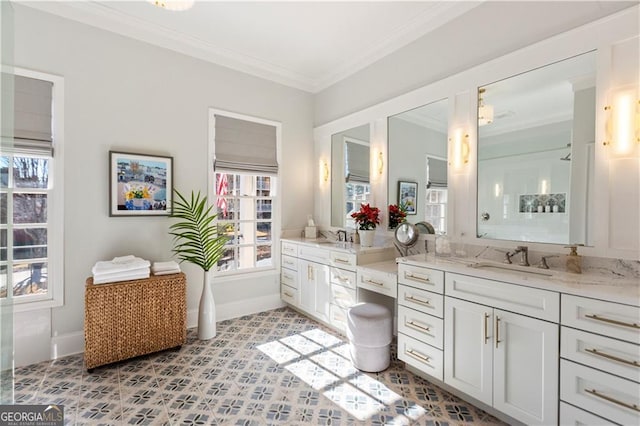 bathroom with vanity and ornamental molding