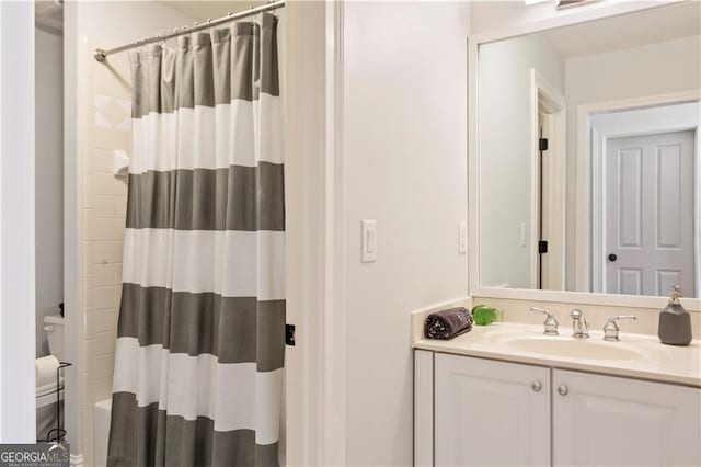 bathroom with vanity and shower / tub combo