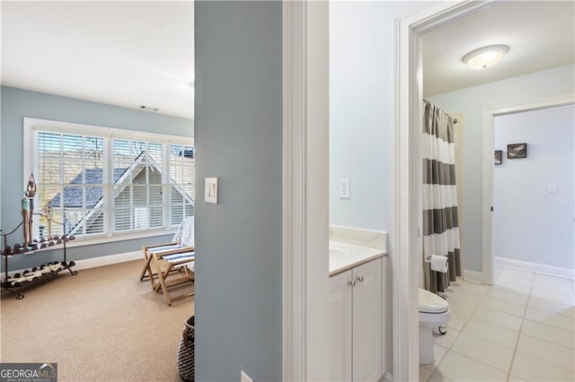 hallway with light tile patterned flooring