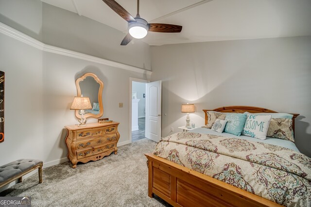 bedroom with ceiling fan and light colored carpet