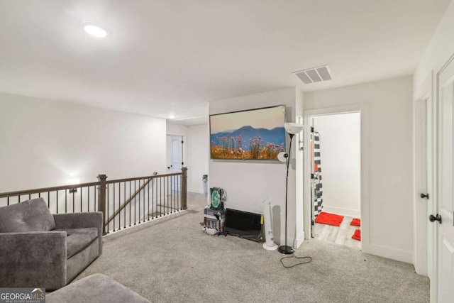 sitting room with light carpet