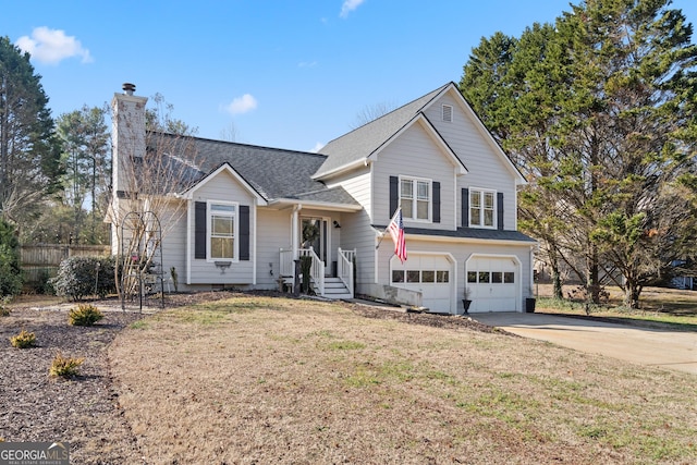 split level home with a chimney, concrete driveway, an attached garage, fence, and a front lawn