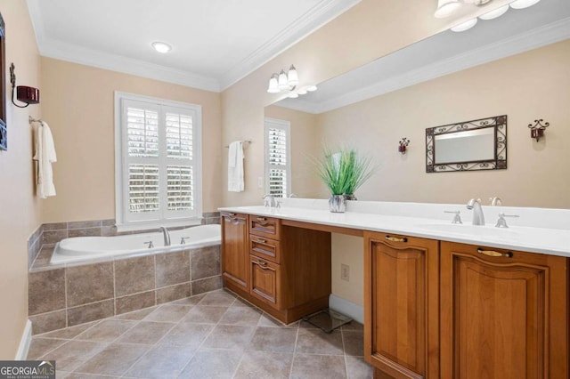 bathroom featuring crown molding, vanity, tile patterned flooring, and tiled tub