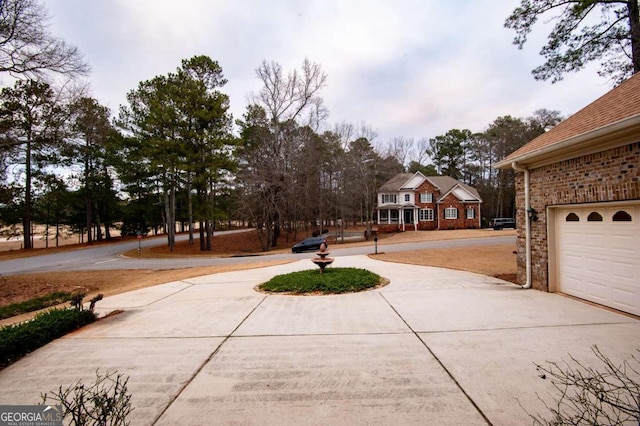 view of yard with a garage