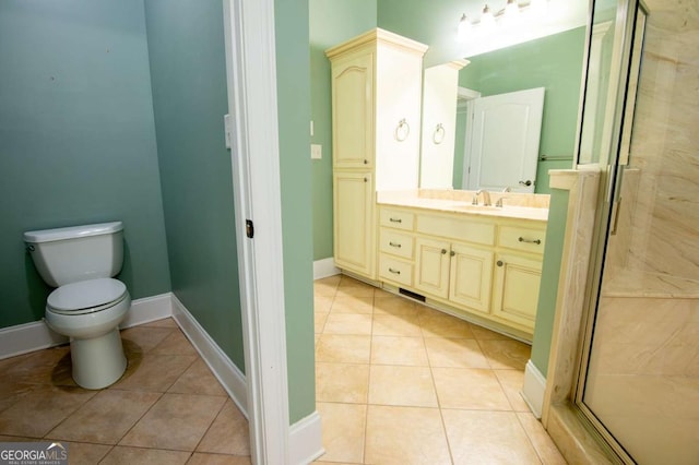 bathroom with walk in shower, tile patterned flooring, vanity, and toilet