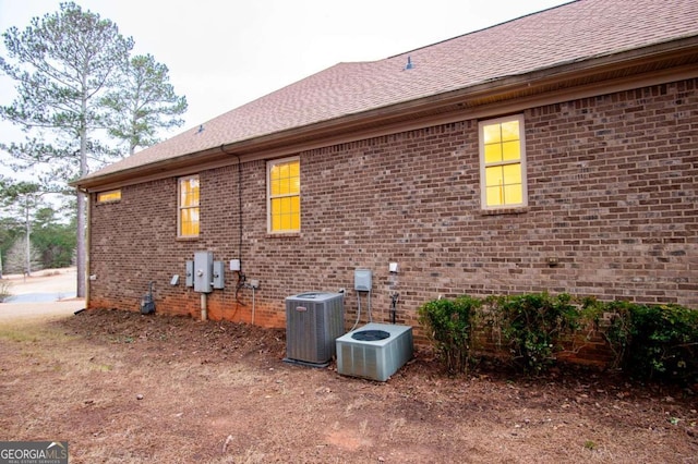 view of home's exterior featuring central AC