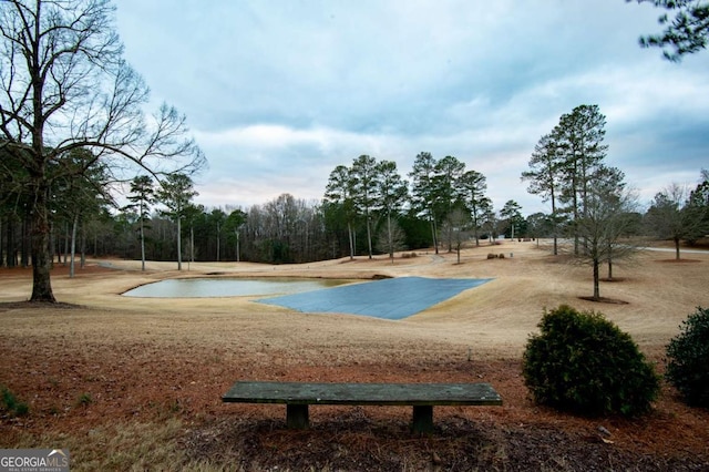 view of community featuring basketball court