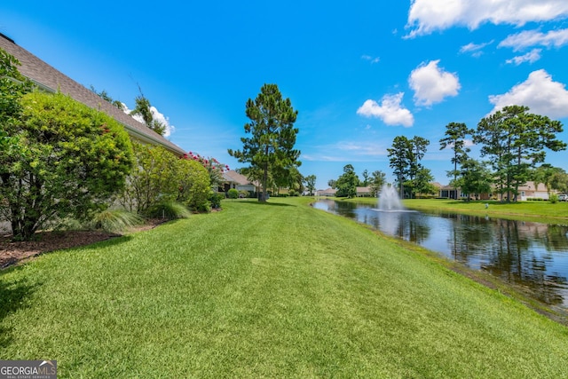 view of yard featuring a water view