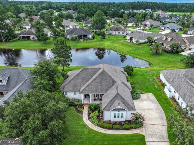 drone / aerial view with a water view