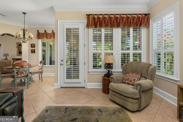 sunroom with a chandelier and a healthy amount of sunlight