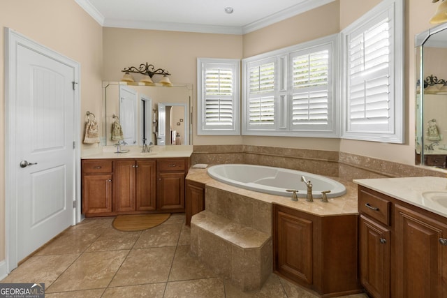 bathroom featuring tile patterned flooring, vanity, ornamental molding, and tiled bath