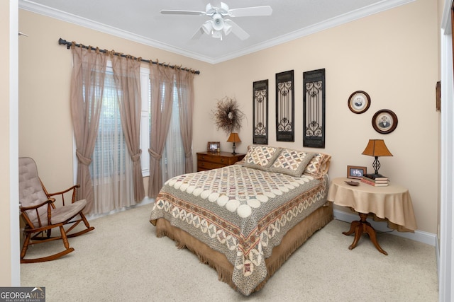 bedroom with carpet, ceiling fan, and ornamental molding