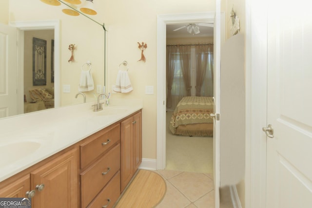 bathroom with tile patterned floors, ceiling fan, and vanity