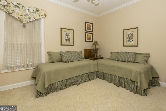 bedroom featuring carpet, ceiling fan, and ornamental molding