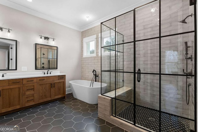 bathroom with vanity, crown molding, tile patterned flooring, and plus walk in shower