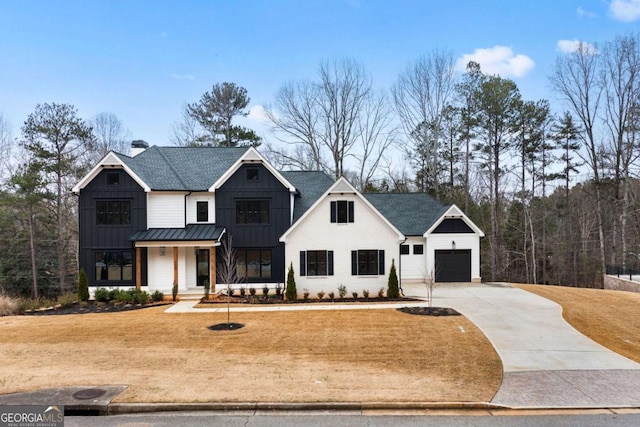 modern inspired farmhouse featuring covered porch