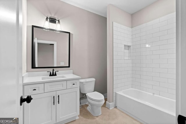 bathroom featuring tile patterned flooring, vanity, and toilet