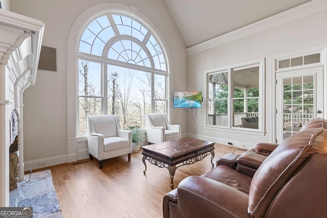 sunroom featuring lofted ceiling