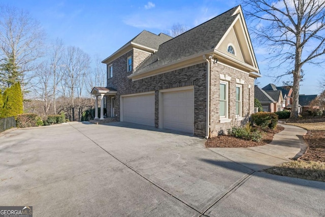 view of property exterior featuring a garage