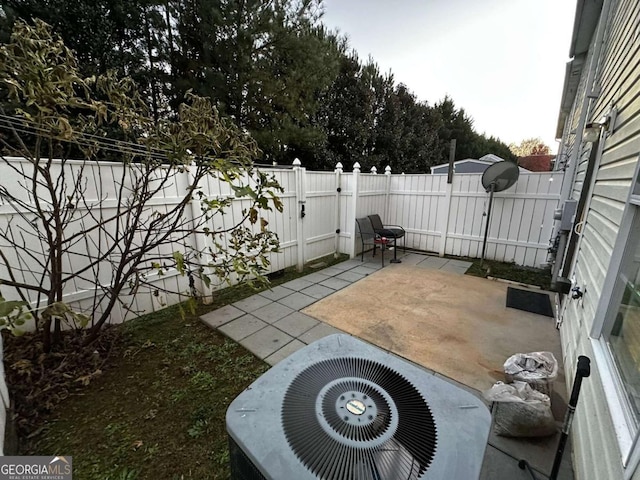 view of patio with cooling unit