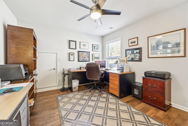 office space with ceiling fan and dark wood-type flooring