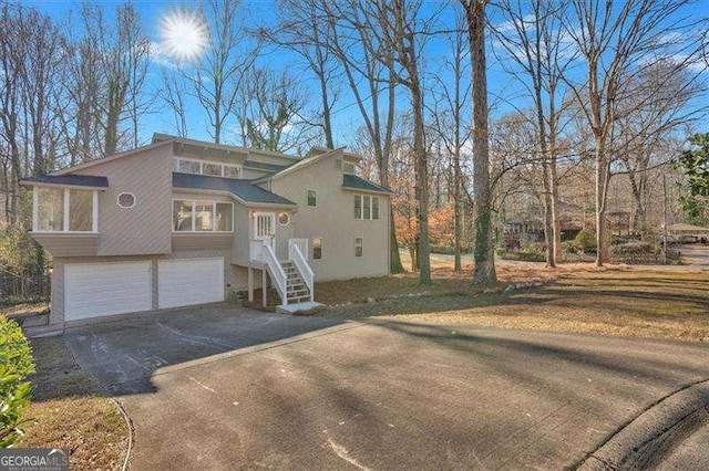 view of front of property with a garage