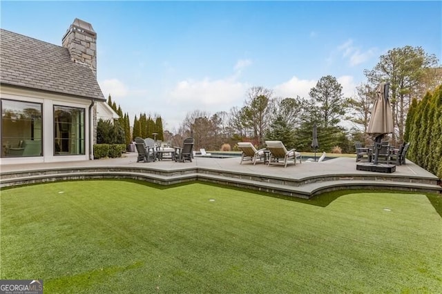 view of yard with a patio area