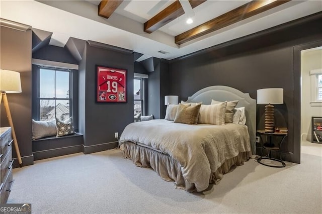 carpeted bedroom featuring beam ceiling