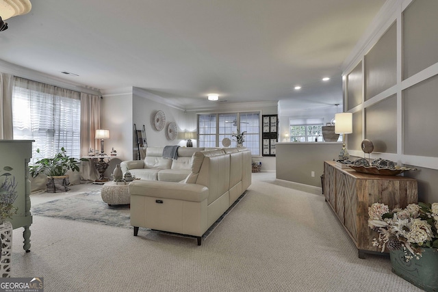 living room featuring crown molding and light carpet