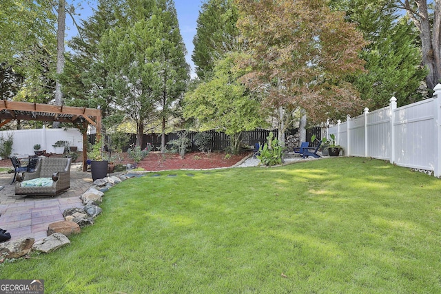 view of yard featuring a pergola and a patio area