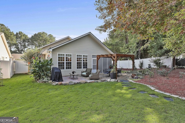 rear view of house featuring a pergola, a patio area, and a yard