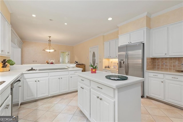 1120 Heards Ferry Rd, Sandy Springs, GA 30328 - kitchen with light tile patterned floors, light countertops, decorative backsplash, white cabinets, and crown molding