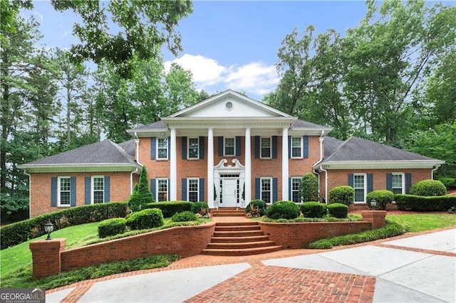 1120 Heards Ferry Rd, Sandy Springs, GA 30328 - neoclassical / greek revival house featuring brick siding