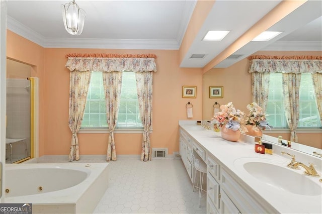 bathroom with vanity, tile patterned floors, crown molding, a tub to relax in, and a notable chandelier