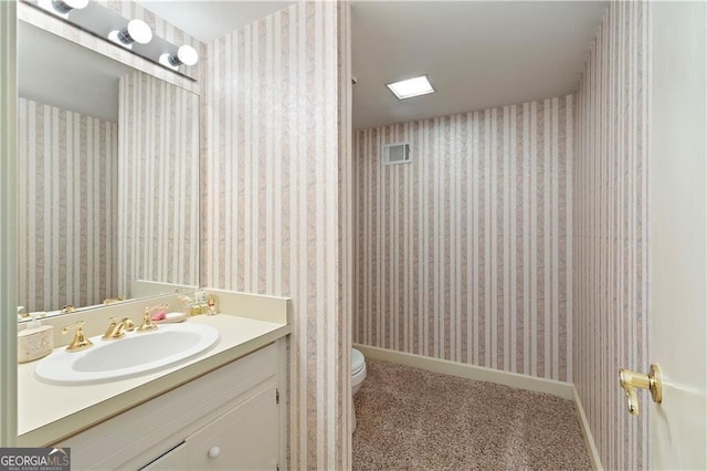 1120 Heards Ferry Rd, Sandy Springs, GA 30328 - bathroom with wallpapered walls and vanity