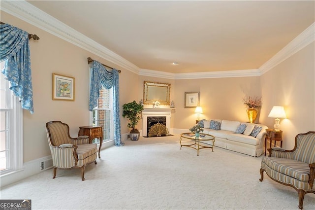 1120 Heards Ferry Rd, Sandy Springs, GA 30328 - living area featuring crown molding, plenty of natural light, carpet, and a fireplace with flush hearth