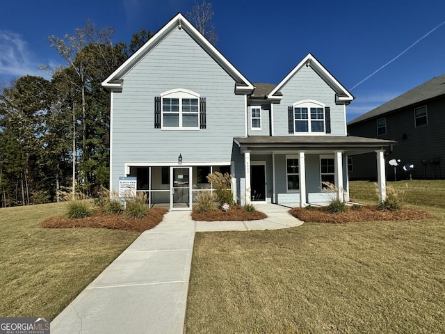 view of front facade featuring a front yard